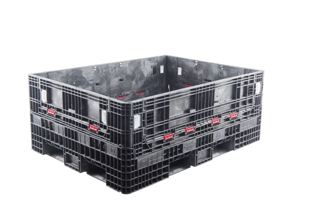 ORBIS HDR6548-25 collapsible bulk container. Black shallow container with doors closed and red hinges, three-quarter view.