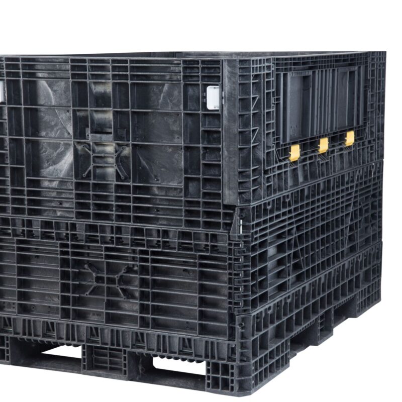 ORBIS HDR7048-50 collapsible bulk container. Black tall container with closed doors and yellow hinges, three-quarter view.